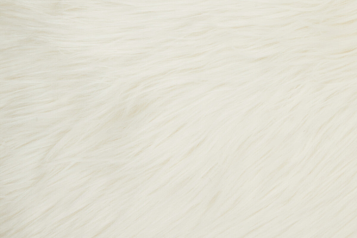 Soft and fluffy Orsina fur cushion in a creamy white shade for luxurious home decor