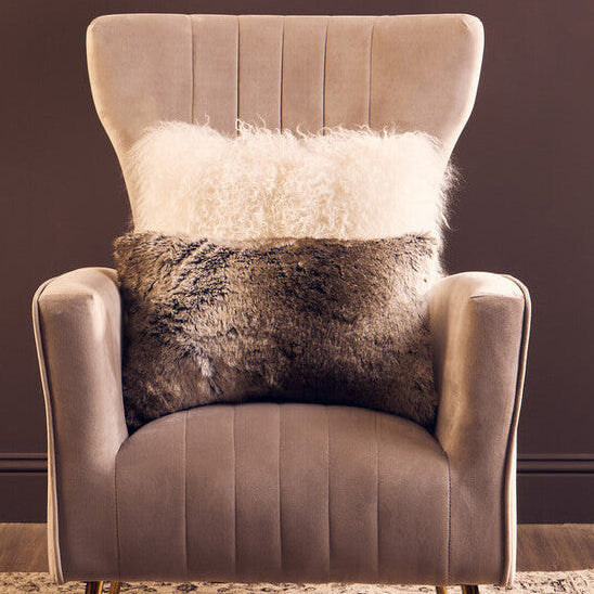 Orsina Fur Cushion on a Stylish Armchair for Luxe Home Decor
