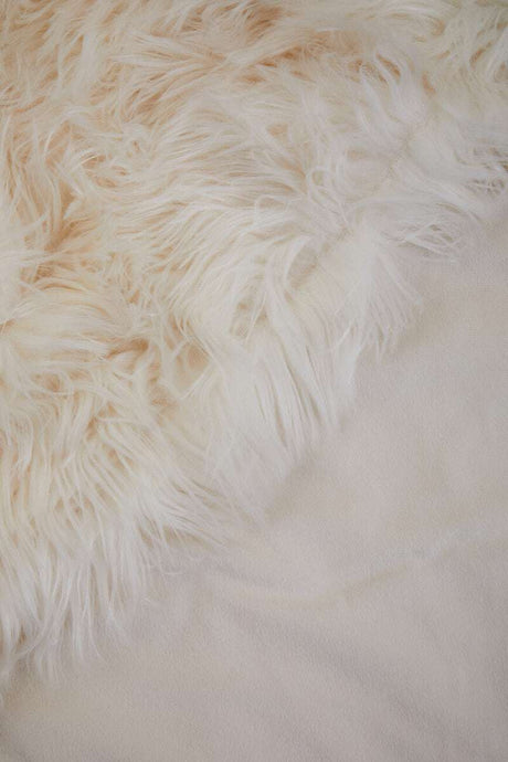Soft Orsina Fur Throw in Cream Colour, Perfect for Adding Warmth and Texture to Your Home