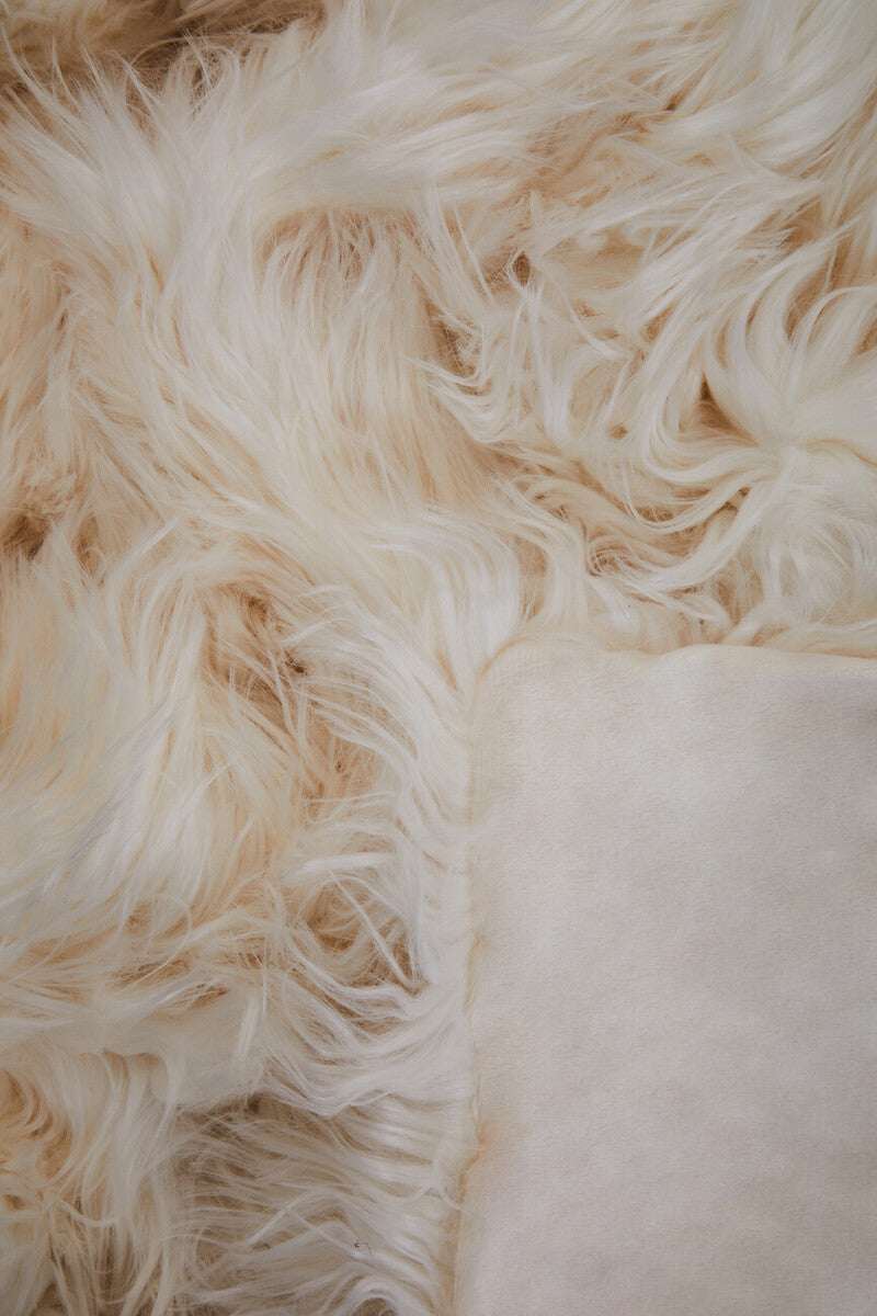 Orsina Luxurious Fur Throw in Soft Cream Shade, Perfect for Adding Comfort to Any Living Space