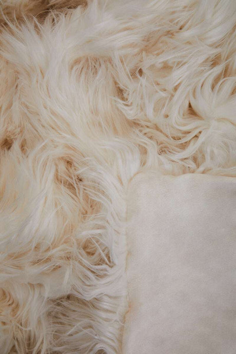Orsina Luxurious Fur Throw in Soft Cream Shade, Perfect for Adding Comfort to Any Living Space