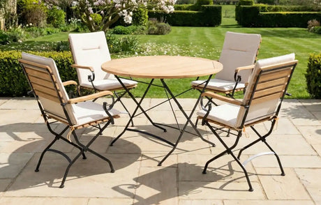 MINT Outdoor Garden Dining Set featuring a round table and four stylish folding chairs