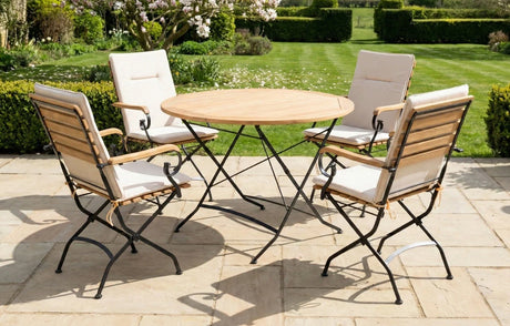 MINT Outdoor Garden Dining Set featuring a round table and four stylish folding chairs