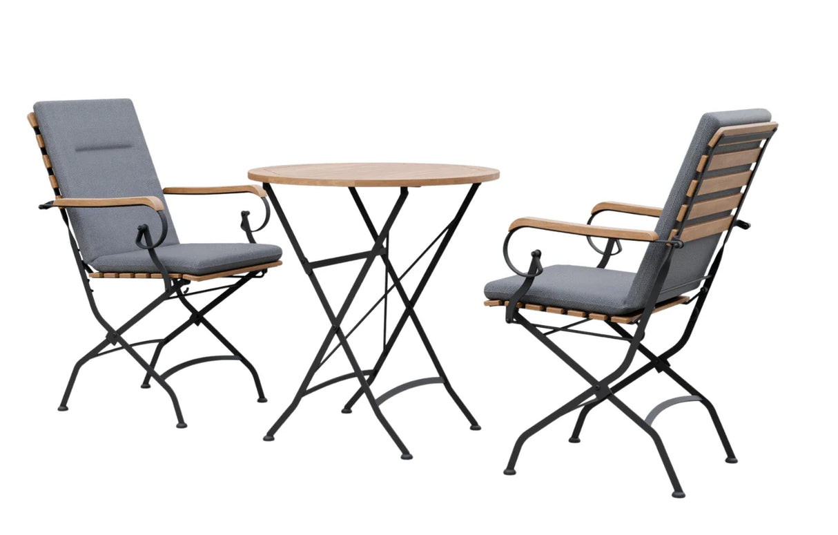 MINT Outdoor Garden Dining Set with two folding chairs and a round wooden table for outdoor dining