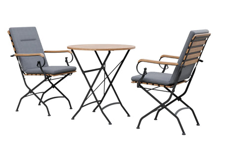 MINT Outdoor Garden Dining Set with two folding chairs and a round wooden table for outdoor dining