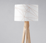 Modern lampshade from Shadow Bright with geometric design on a tripod lamp base