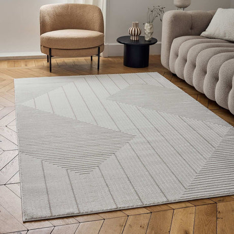 Stylish geometric rug in soft cream with textured patterns, perfect for modern living spaces
