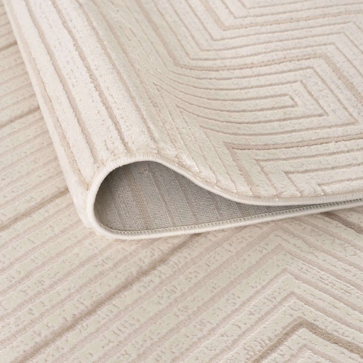 Elegant Geometric Rug in cream with textured pattern, perfect for modern interiors