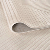 Soft cream Geometric Rug with subtle textured patterns, perfect for modern home decor