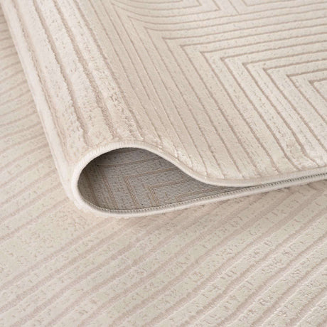 Soft cream Geometric Rug with subtle textured patterns, perfect for modern home decor