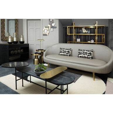 Stylish living room featuring an Orsina Geometric Rug under a modern coffee table and sofa