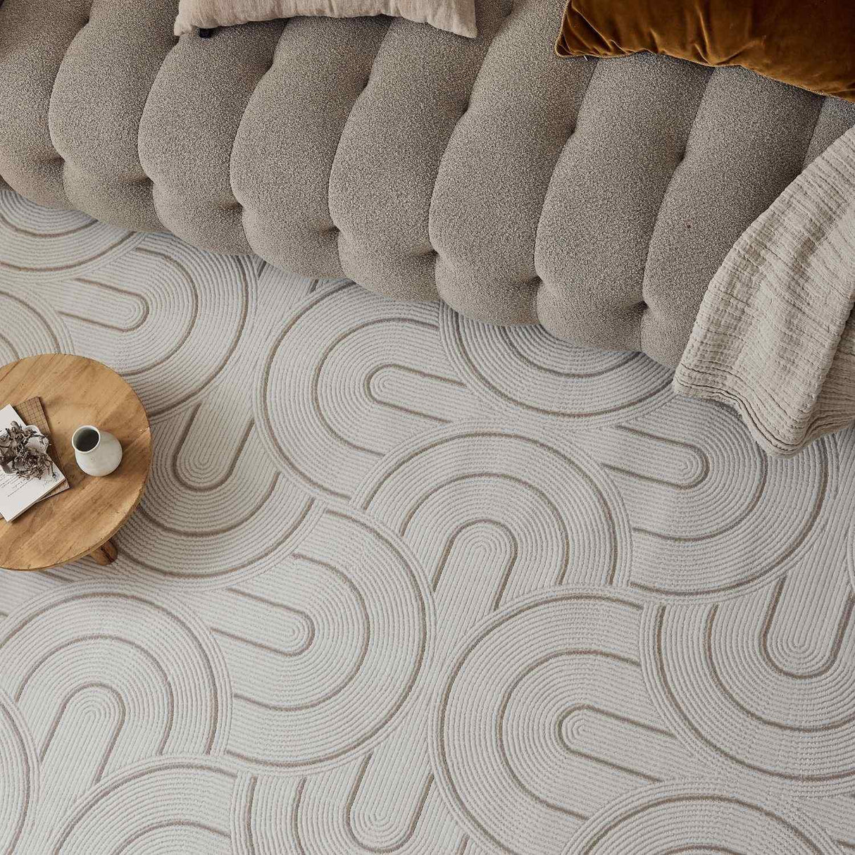 Stylish Geometric Rug with soft texture, placed under a modern sofa and coffee table