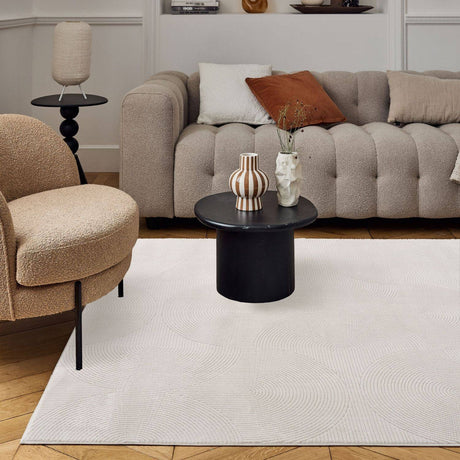 Stylish Geometric Rug in a modern living room with beige furniture and decorative items