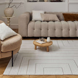 Elegant Geometric Rug in neutral tones enhancing a modern living room with stylish furniture