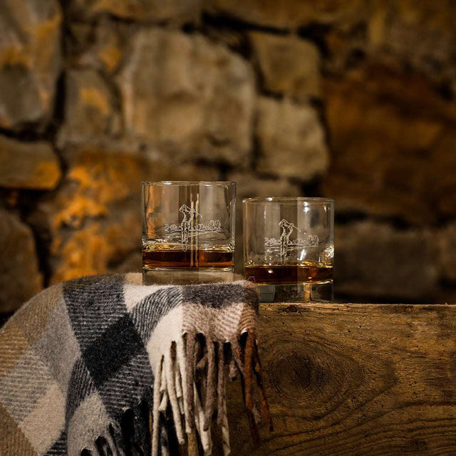 Selbrae House Glass Tumblers for enjoying whisky with a stylish checkered blanket