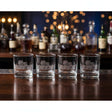 Set of four Selbrae House glass tumblers with intricate lion design, perfect for entertaining guests