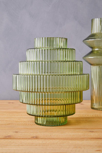 Stylish Glass Vase from Orsina with a ribbed design in green, perfect for home decor.