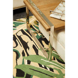 Stylish Green Rug with a Floral Pattern Under a Modern Coffee Table for Contemporary Living Spaces