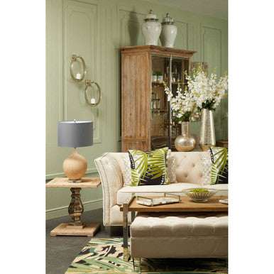 Stylish living room featuring an Orsina Green Rug complementing neutral tones and decorative elements