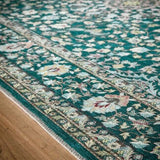 Elegant green rug featuring intricate floral patterns and detailed borders for stylish home decor