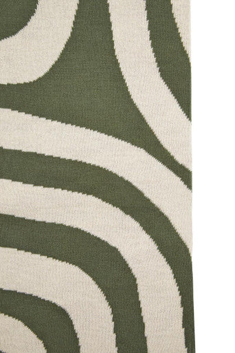 Orsina Green Throw with a stylish wave pattern for cozy home decor