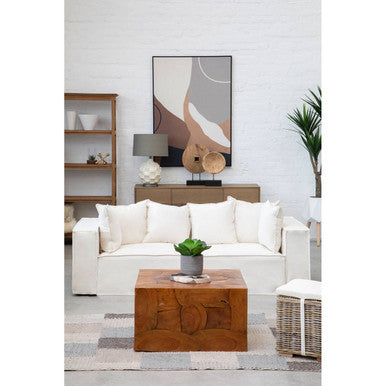 Stylish living room showcasing a Grid Design Rug under a coffee table with greenery