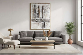 Stylish living room with a Hand Painted Canvas art piece above a grey sofa and coffee table