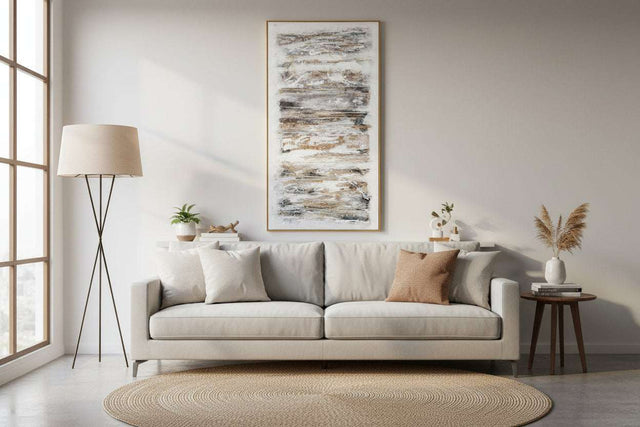Elegant living room featuring a hand painted canvas above a stylish sofa with neutral decor