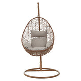 Orsina Hanging Chair with a comfortable cushion in a stylish woven design for outdoor relaxation