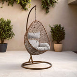 Orsina Hanging Chair with a modern design featuring soft cushions for outdoor relaxation