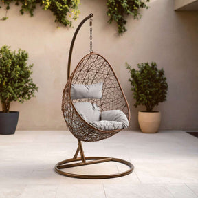 Orsina Hanging Chair with a modern design featuring soft cushions for outdoor relaxation