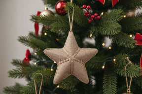 Hanging Star Christmas bauble in natural fabric, perfect for festive tree decorations