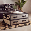 Orsina Hemp Rug featuring a stylish woven design under a modern coffee table