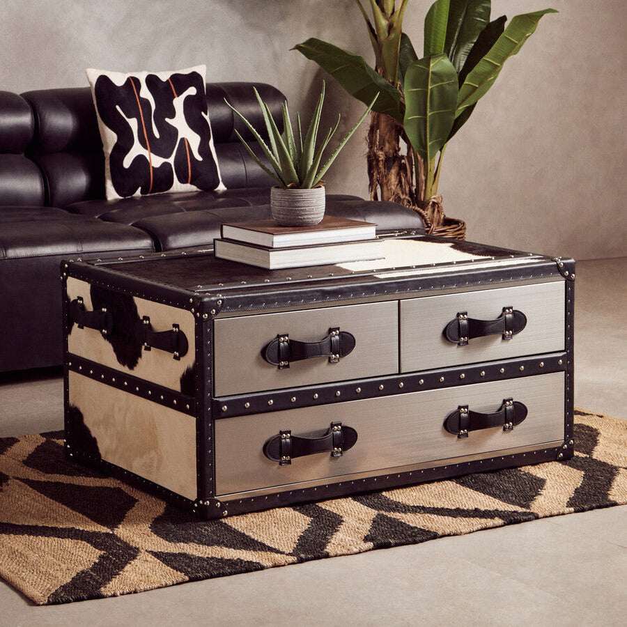 Orsina Hemp Rug featuring a stylish woven design under a modern coffee table