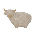 Highland Cow figurine in light beige with textured woolly design for festive home room decorations