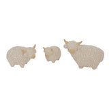 Set of three decorative Highland Cow figures for festive home room decorations
