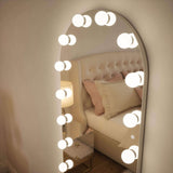 Elegant Hollywood Mirror with bright bulbs, perfect for dressing rooms and enhancing makeup applications