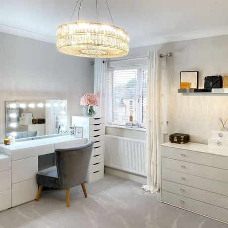 Modern vanity area with a Hollywood Mirror, stylish furniture, and elegant decor for a chic makeup space