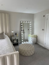 Elegant Hollywood Mirror with LED Lights in a Modern Bedroom Setting