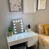 Compact Hollywood Mirror on a White Vanity Table in a Stylish Bedroom Setup