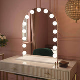 Elegant Hollywood Mirror with bright lights and arch design, perfect for vanity setups