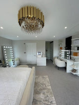 Stylish Hollywood Mirror in a modern bedroom with elegant decor and bright lighting