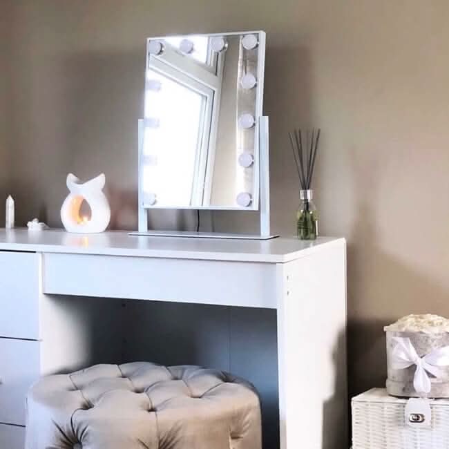 Stylish Hollywood Mirror on a white vanity unit, perfect for makeup and dressing use
