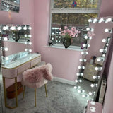 Elegant Hollywood Mirror with LED Lights in Glamorous Bedroom Setting