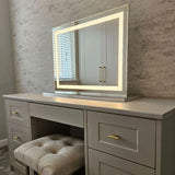 Elegant Pro Mirror on a stylish vanity unit with soft backlighting for makeup application