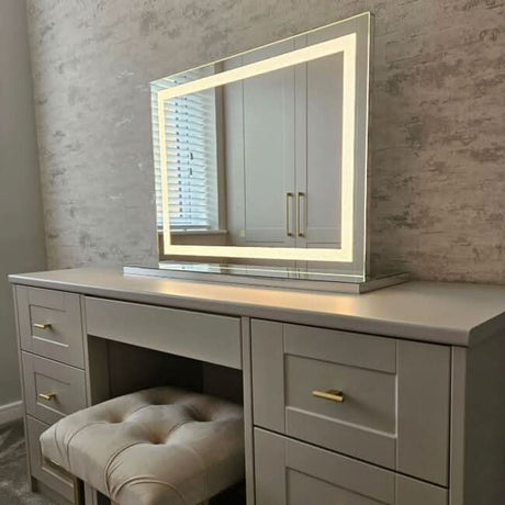 Elegant Pro Mirror on a stylish vanity unit with soft backlighting for makeup application