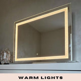 Pro Mirror with warm lights, ideal for makeup application and professional grooming needs