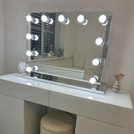 Stylish Hollywood Mirror with Bright Bulbs on a Sleek Vanity for Perfect Makeup Application