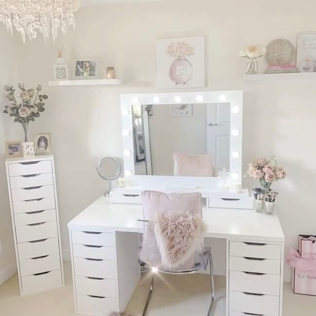 Elegant Hollywood Mirror above a stylish white vanity with soft lighting and decorative elements