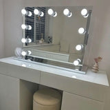 Hollywood Mirror with Bright LED Lights on a Stylish Vanity Table for Perfect Make-up Application